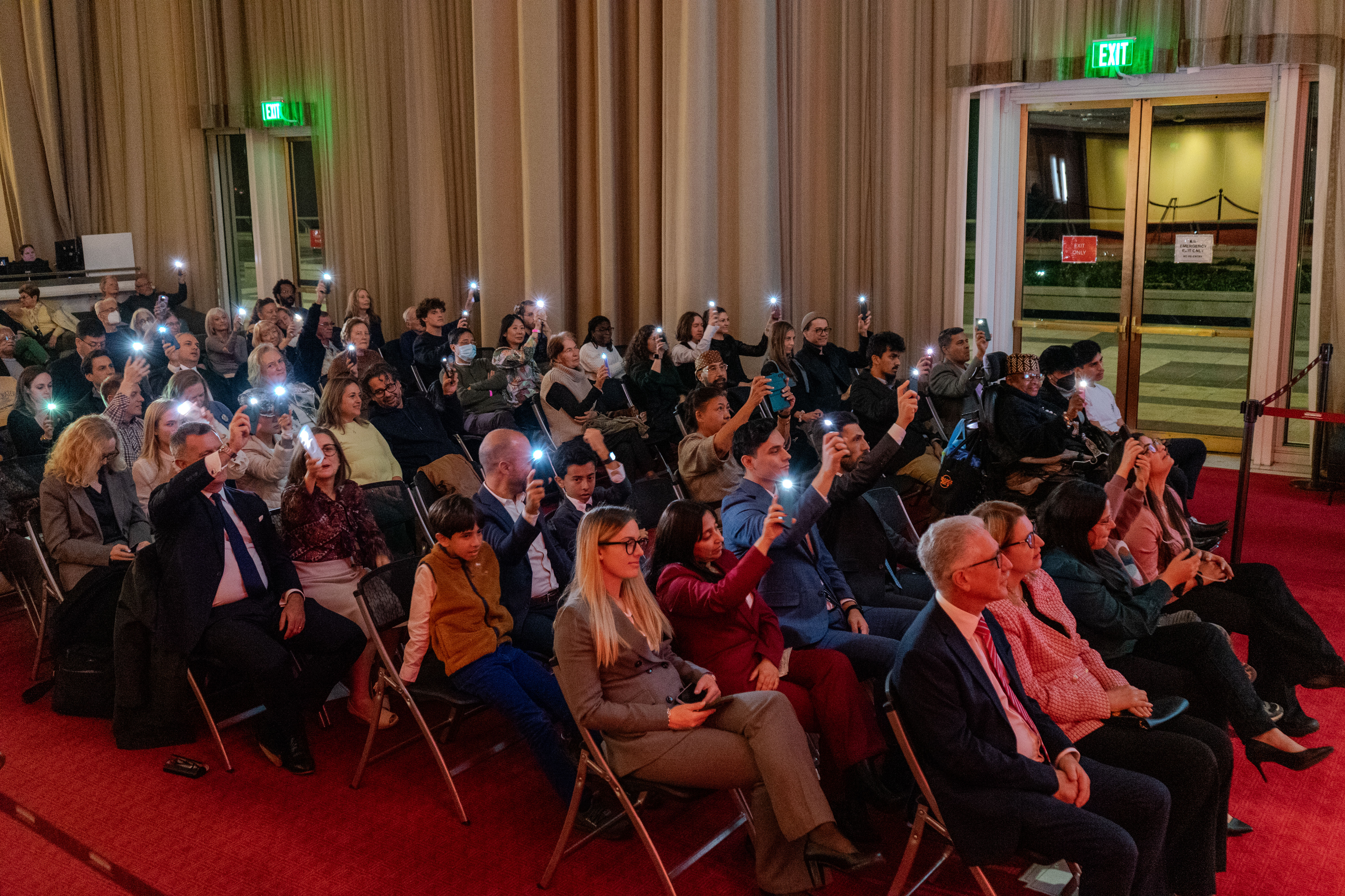 The audience appreciating Maltese traditional music.