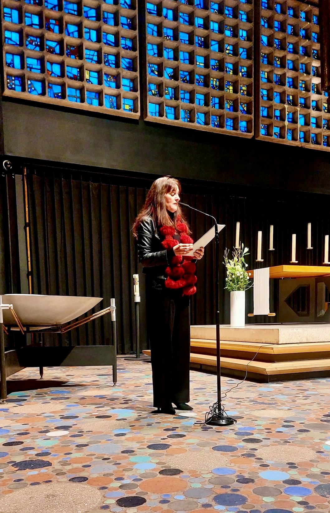 Ambassador delivering speech before performance