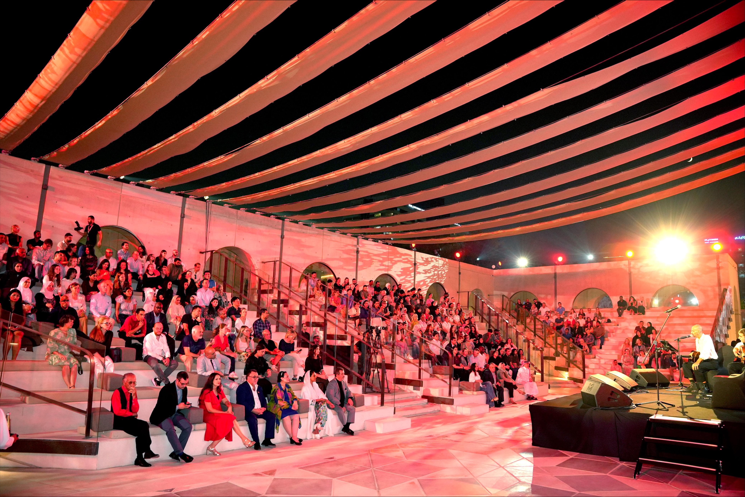 Seated audience at the Maltese Ghannejja event.