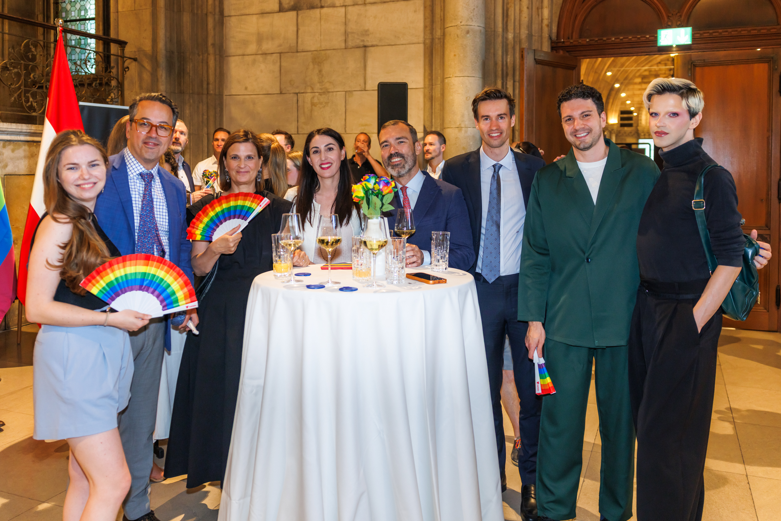 Guests at the reception enjoying MTA promotional materials and Maltese beverages
